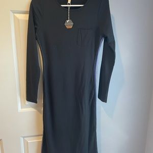 Black long sleeve maternity dress.